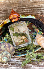 Load image into Gallery viewer, Sea Witch Ritual Oil - Sea Magick Oil, Witchcraft, Water Goddess, Magia de Sirena, Mermaid Oil, Authentic Larimar Stones
